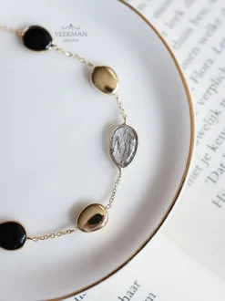Geelgouden armband met onyx en rutiel + Luxe Cadeau