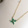 Geelgouden collier met smaragd bloem + Luxe Cadeau