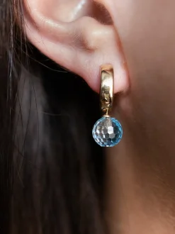 Geelgouden creolen met blauwe topaas + Luxe Cadeau