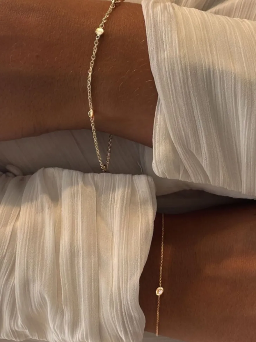 Geelgouden schakelarmband met gouden elementen + Luxe Cadeau