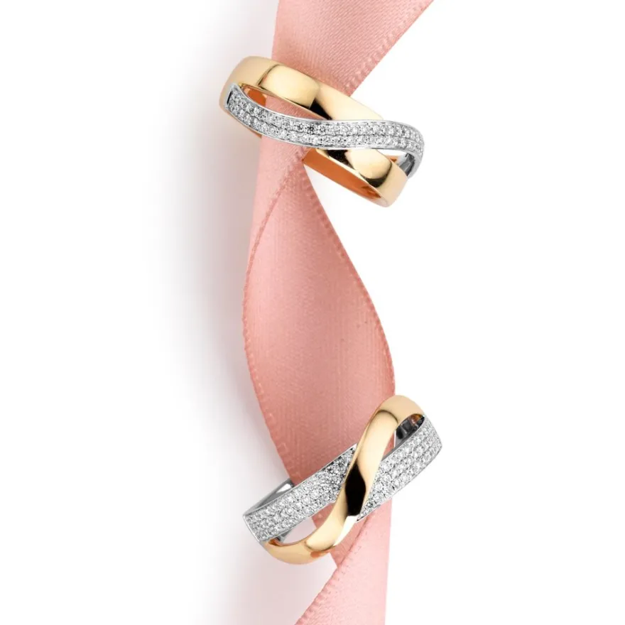 Slagring bicolor met briljant 0.26 crt. + Luxe cadeau